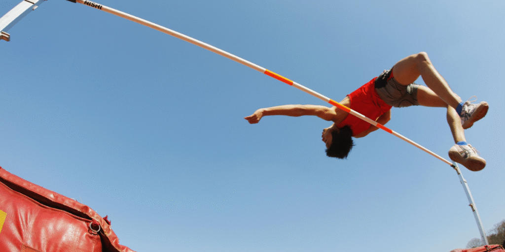 A man is jumping with the help of lashing webbings
