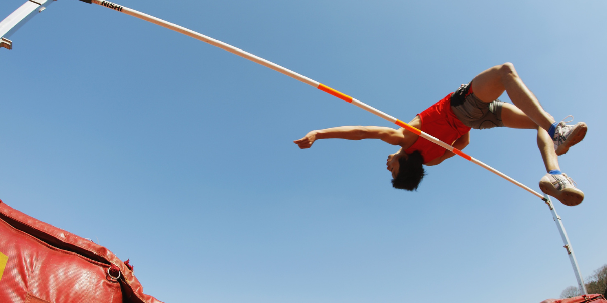 A man is jumping with the help of lashing webbings