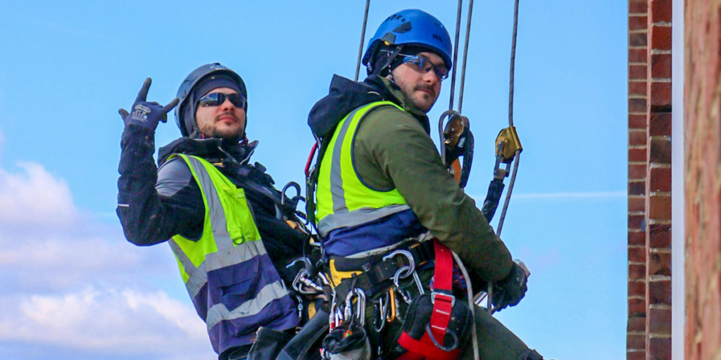 Safety Harness Buying Guide - The two persons taking care of it while climbing